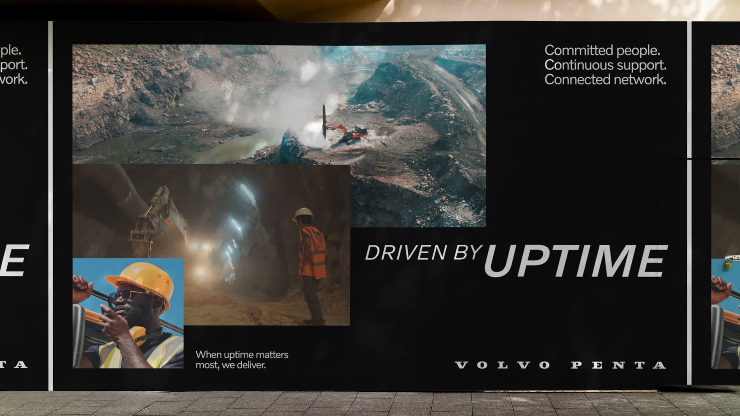 Volvo Penta outdoor billboard with industrial machinery and workers