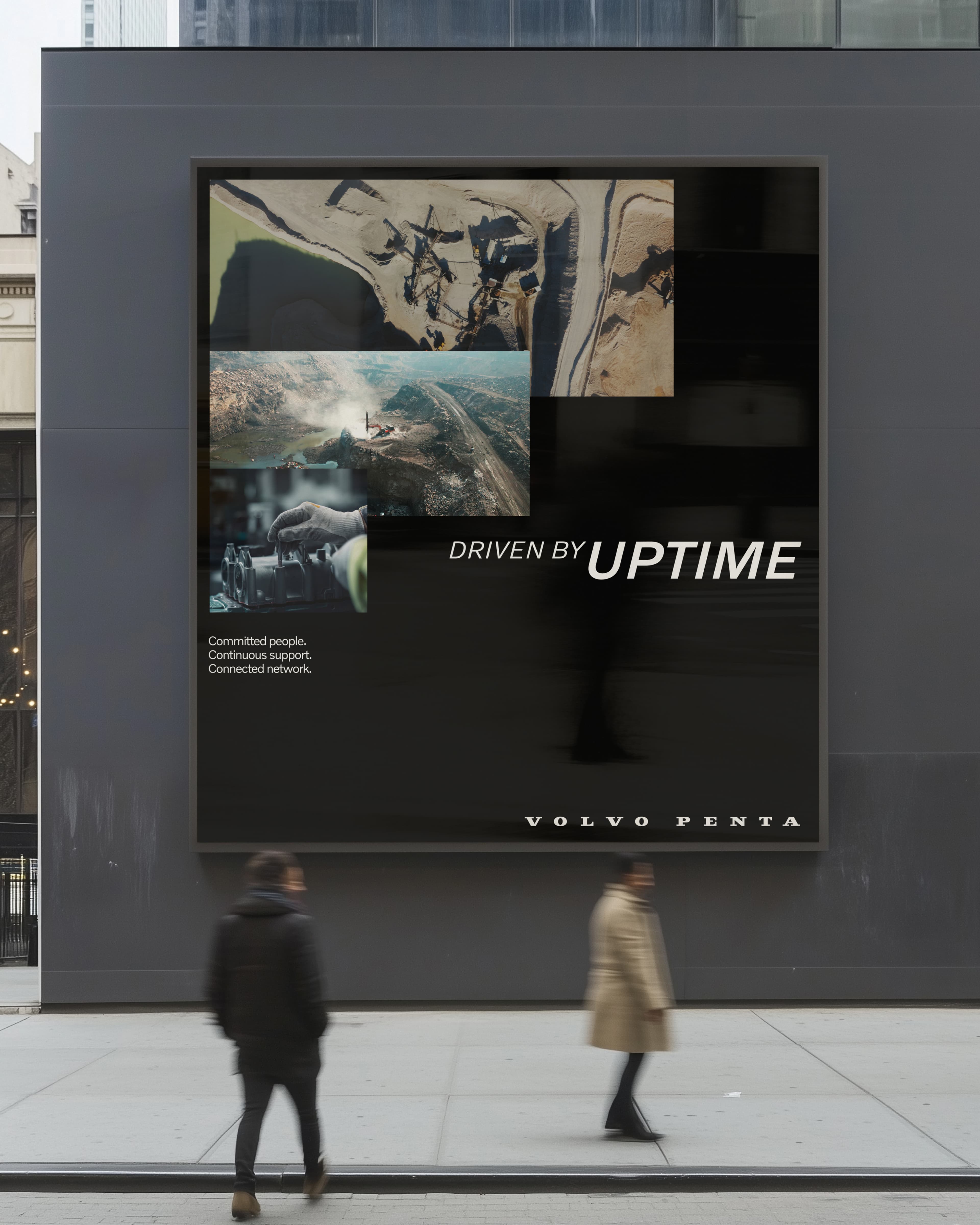 Picture of a portrait sized billboard on the wall outside with people walking next to it.