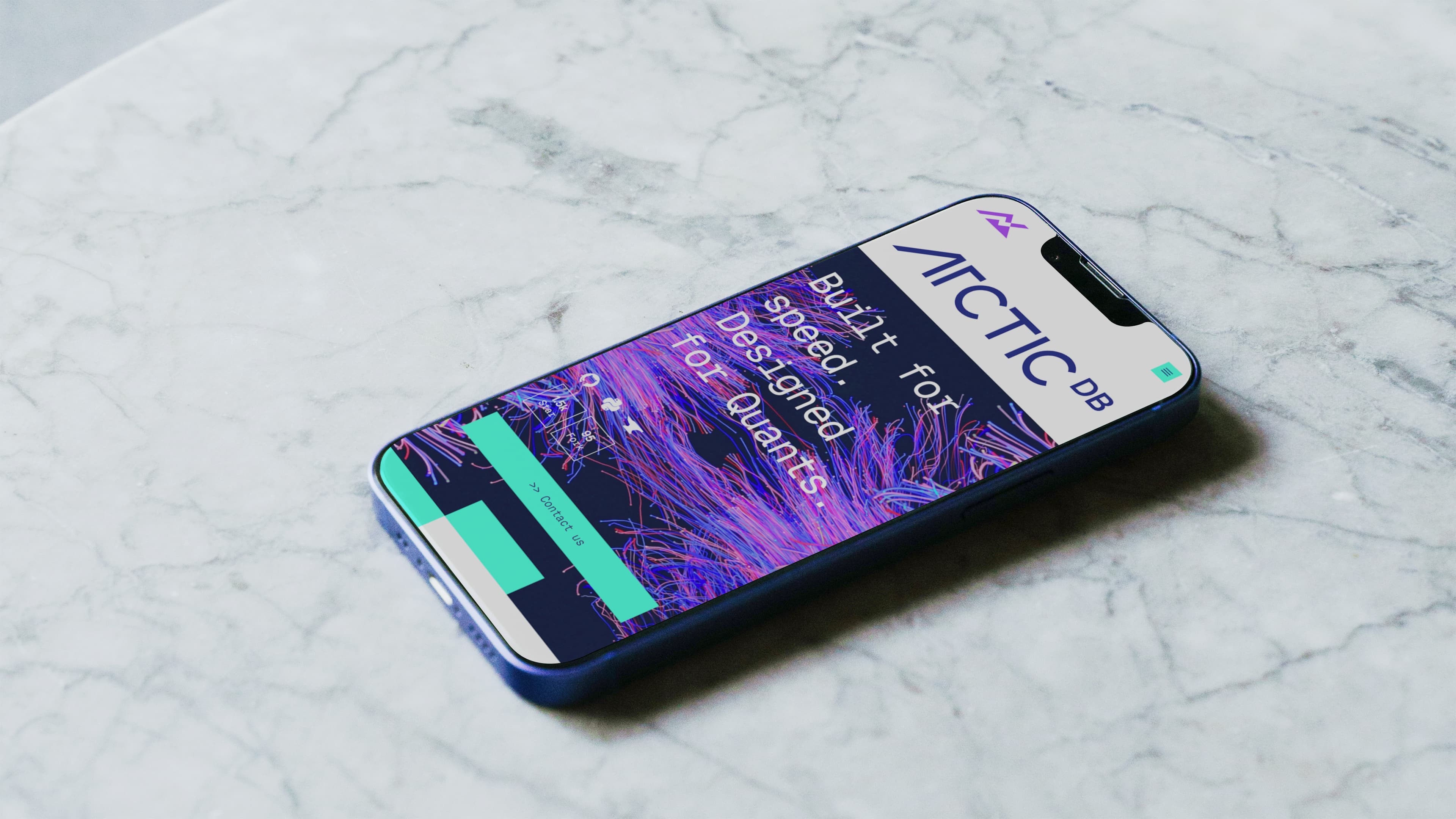 Smartphone on a marble surface displaying the Arctic DB website, featuring the tagline "Built for speed. Designed for quants." with vibrant abstract graphics and a "Contact us" button.