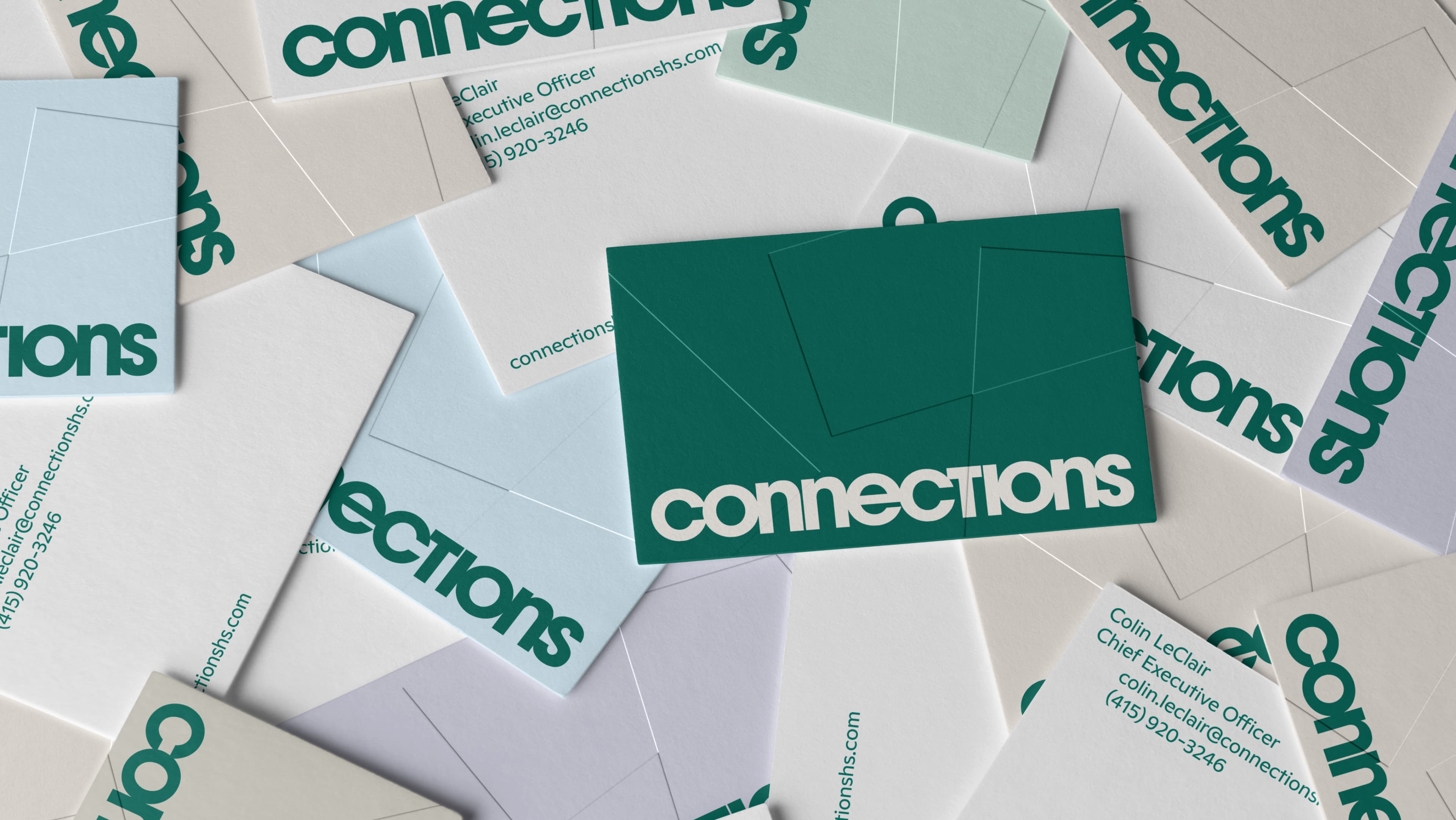 Multiple Connections business cards scattered in teal, white, light blue, and sage green, showing the brand logo and contact details for Colin LeClair, Chief Executive Officer, at colin.leclair@connectionshs.com and (415) 920-3246; the central teal card features a geometric line pattern on its reverse.