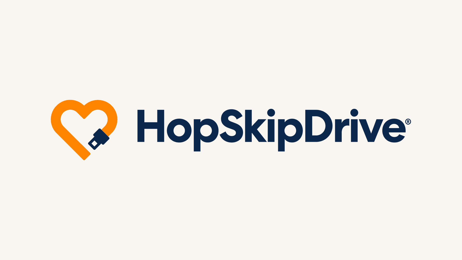 HopSkipDrive logo with orange heart-shaped seatbelt and dark blue text on a light background.