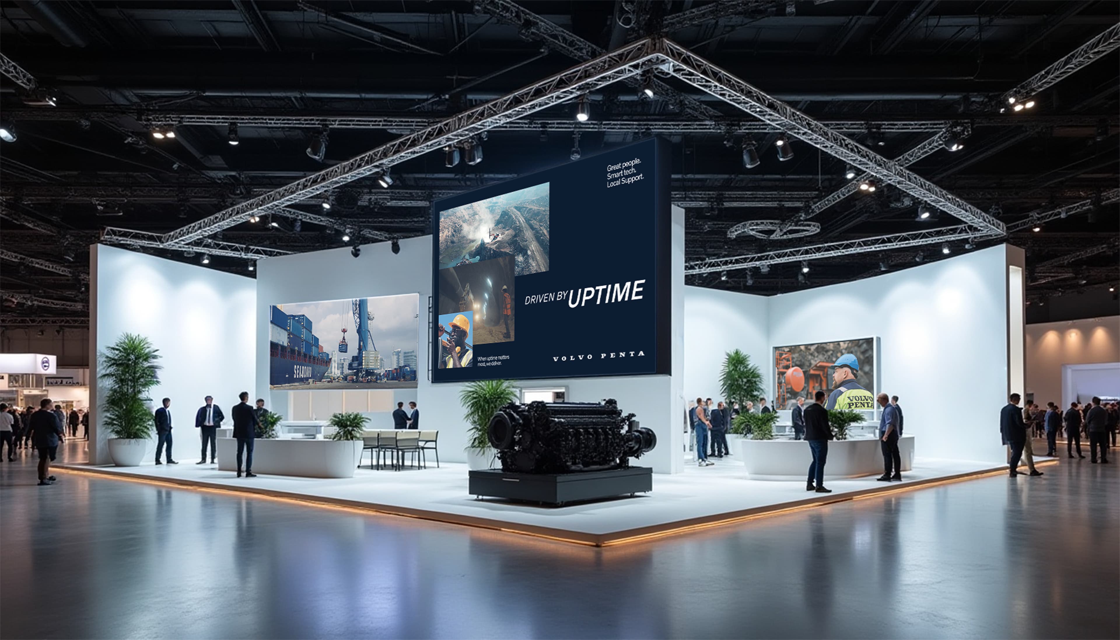 Picture of a expo of a potential Volvo Penta tent with adverts and video on several screens.