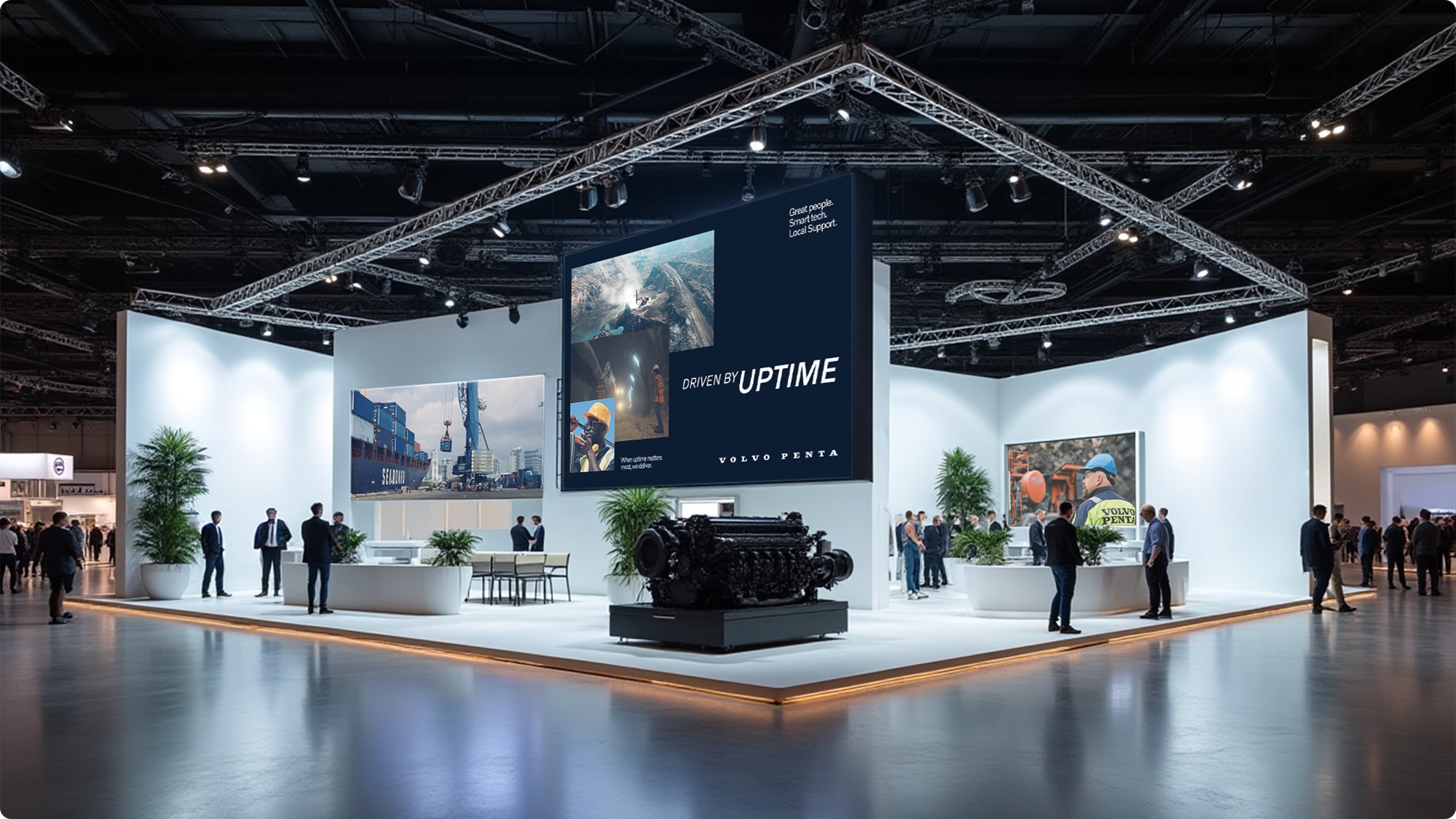 Picture of a expo of a potential Volvo Penta tent with adverts and video on several screens.